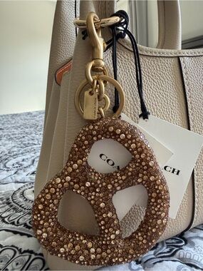 Coach Neutral Pebbled Leather Tote with Gold-Tone Crystal Pretzel Charm